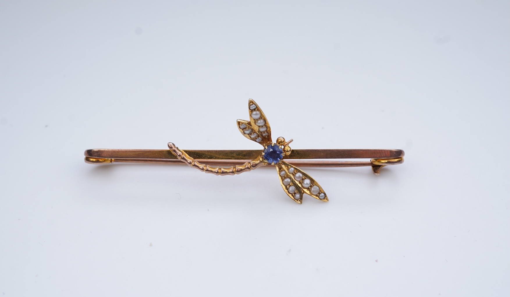An Edwardian seed pearl and sapphire bar brooch, early 20th century